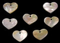 Hand Carved Gold Mother of Pearl Hearts with a Drilled Hole measuring 1"   Sold Each    60826