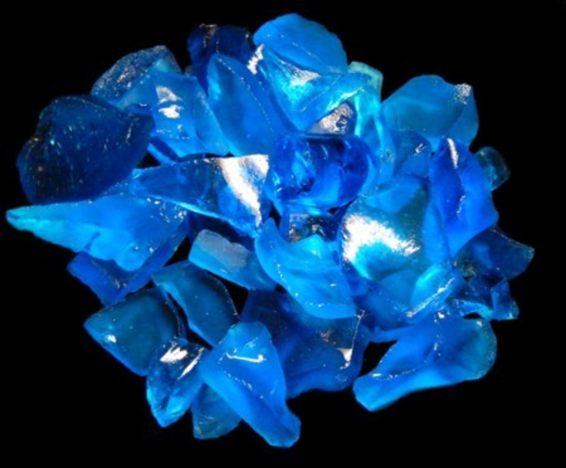 Teal Color Sea Glass measuring 1/2 to 2" Sold by the 1/4 pound    61026